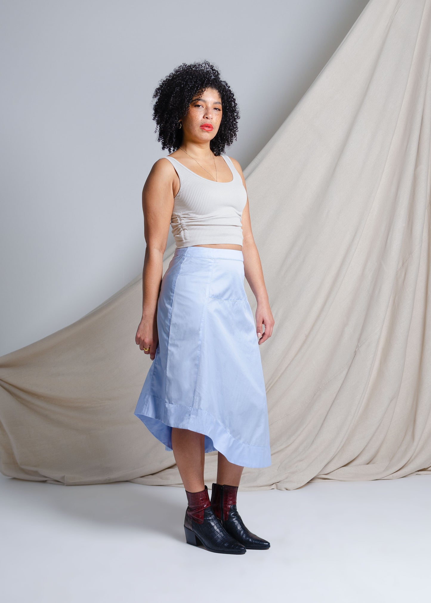 Asymmetrical sky blue midi skirt in crisp cotton fabric
