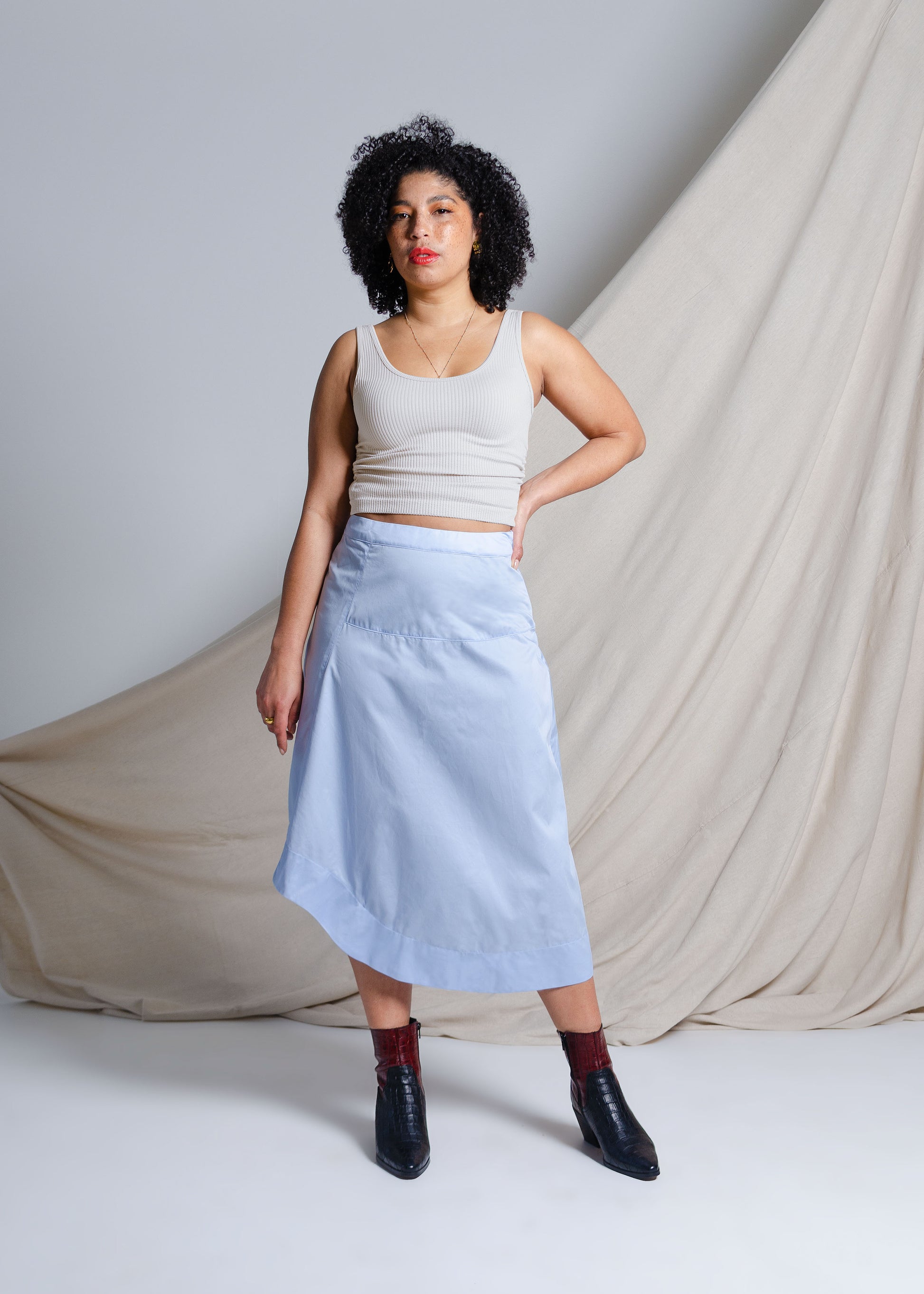 Asymmetrical sky blue midi skirt in crisp cotton fabric 