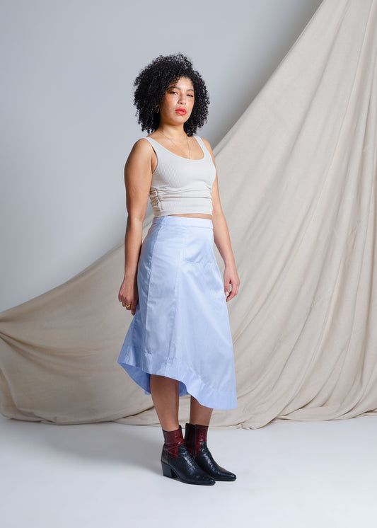 Asymmetrical sky blue midi skirt in crisp cotton fabric 